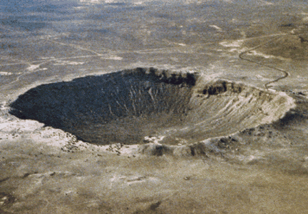 This is the Barringer Meteor Crater in Arizona. The diameter is 1.2
  kilomters, and it is 49,000 years old. Compared with other planets, <a
  href="/earth/Interior_Structure/crater.html&edu=elem">impact
  craters</a> are rare <a
  href="/earth/Interior_Structure/surface_features.html&edu=elem">surface
  features</a> on Earth. There are two main reasons for the low number of
  craters. One is that our <a
  href="/earth/Atmosphere/overview.html&edu=elem">atmosphere</a>
  burns up most <a
  href="/our_solar_system/meteors/meteors.html&edu=elem">meteoroids</a>
  before they reach the surface. The other reason is that Earth's surface is <a
  href="/earth/interior/plate_tectonics.html&edu=elem">continually
  active</a> and erases the marks of craters over time.<p><small><em>D. Roddy and LPI</em></small></p>