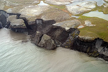 As permafrost thaws, the land, atmosphere, water resources, ecosystems, and human communities are affected. Coastal areas and hillsides are vulnerable to erosion by thawing of permafrost.  Thawing permafrost also causes a positive feedback to global warming, as carbon trapped within the once-frozen soils is released as <a href="/physical_science/chemistry/methane.html">methane</a>, a powerful <a href="/earth/climate/cli_greengas.html">greenhouse gas</a>.
Watch the NBC Learn video - <a href="/earth/changing_planet/permafrost_methane_intro.html">Thawing Permafrost and Methane</a> to find out more.<p><small><em>Image courtesy of the    USGS</em></small></p>