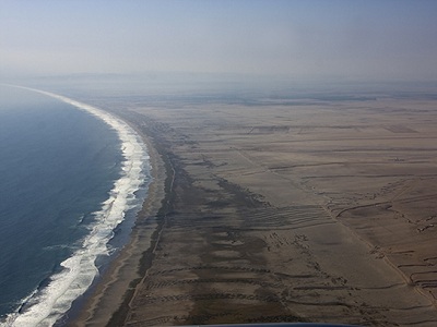 A view of Arica, Chile, at the beginning of a <a href="/people/postcards/vocals/vocals_post.html&dev=">research campaign to study climate science in the southeastern Pacific</a>. Arica is near the <a href="/earth/atacama_desert.html&dev=">Atacama Desert</a>, one of the most <a href="/earth/extreme_environments_hot_cold_dry.html&dev=">arid</a> and barren places on Earth.<p><small><em>Image courtesy of Carlye Calvin, UCAR</em></small></p>