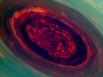 The spinning vortex of <a href="https://www.windows2universe.org/saturn/saturn.html">Saturn</a>'s north polar storm resembles a giant deep red rose surrounded by green foliage in this false-color <a href="http://www.nasa.gov/mission_pages/cassini/multimedia/pia14944.html">image</a> from NASA's <a href="https://www.windows2universe.org/missions/cassini.html">Cassini spacecraft</a>. The eye is 2,000 kilometers across with cloud speeds as fast as 150 meters per second.
It is not known how long this newly discovered north-polar <a href="https://www.windows2universe.org/earth/Atmosphere/hurricane/hurricane.html">hurricane</a> has been active.
The view was acquired at a distance of approximately 419,000 kilometers from Saturn.<p><small><em>NASA/JPL-Caltech/SSI</em></small></p>